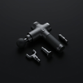 Percussion Massage Gun on onyx background